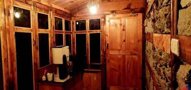 Parvati's Lap Hostel and Villa parvati valley, kasol, Himalayas - The room features comfortable single beds with clean bedding and warm wooden interiors. Ideal for small groups seeking a private hostel room near Tosh and Kheerganga trek base.