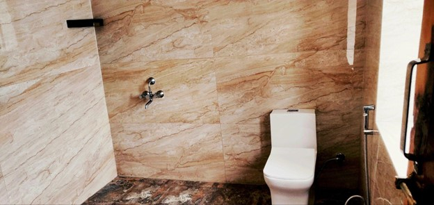 Parvati's Lap Hostel and Villa parvati valley, kasol, Himalayas - Spacious and well-designed bathroom with modern fittings and natural stone-style tiles, offering a clean and refreshing experience. Ideal for travelers seeking comfort and hygiene after long treks in Parvati Valley.